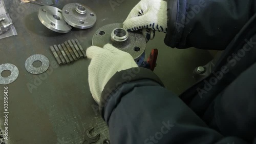 Install the Gasket in the Valve. Hands in Gloves
