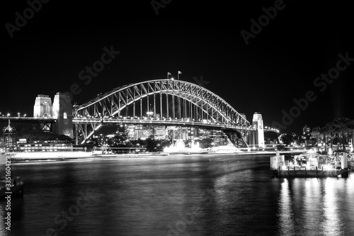 Black and white photo of Sydney Harbour Bridge at night