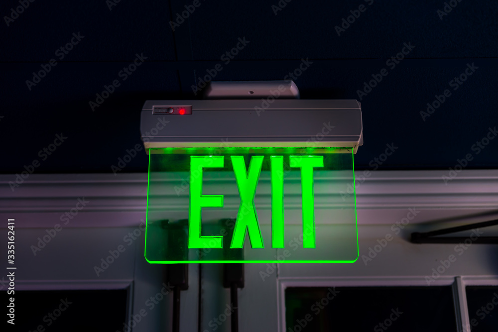 Growing green exit sign for emergency case Growing green exit sign for emergency case