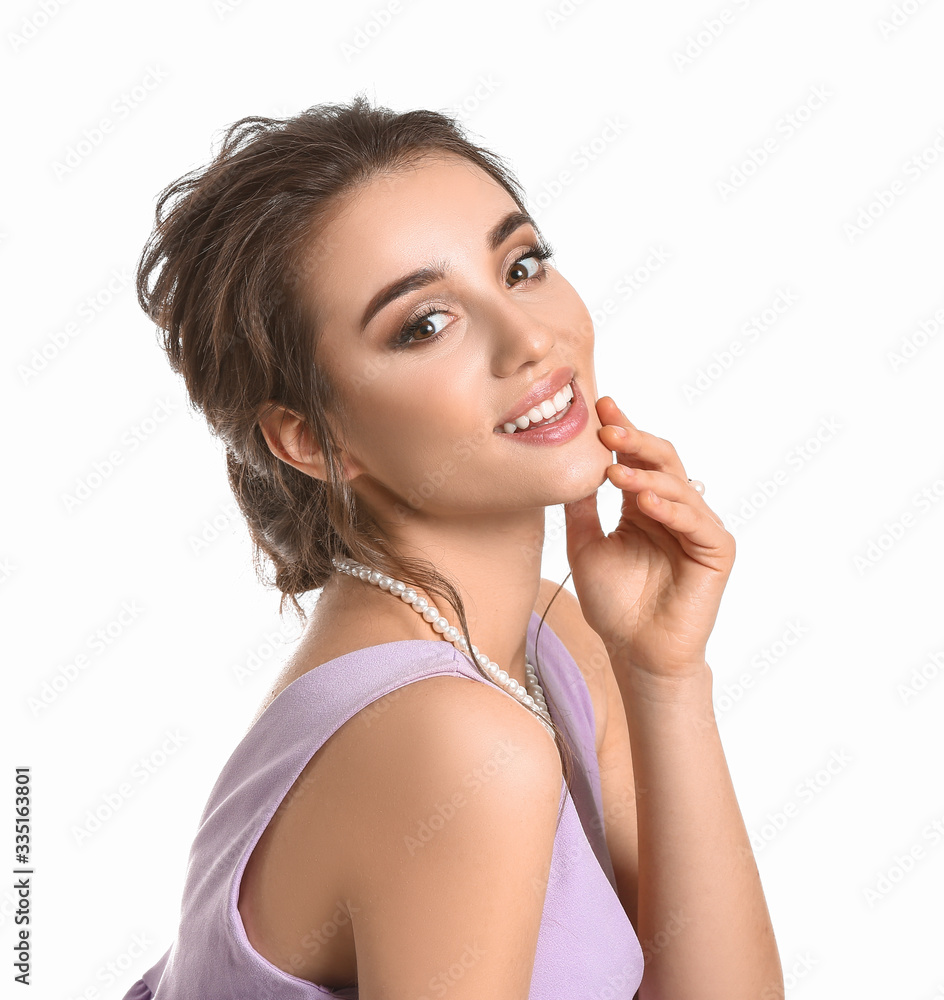 Young woman with beautiful hairdo on white background Young woman with beautiful hairdo on white background