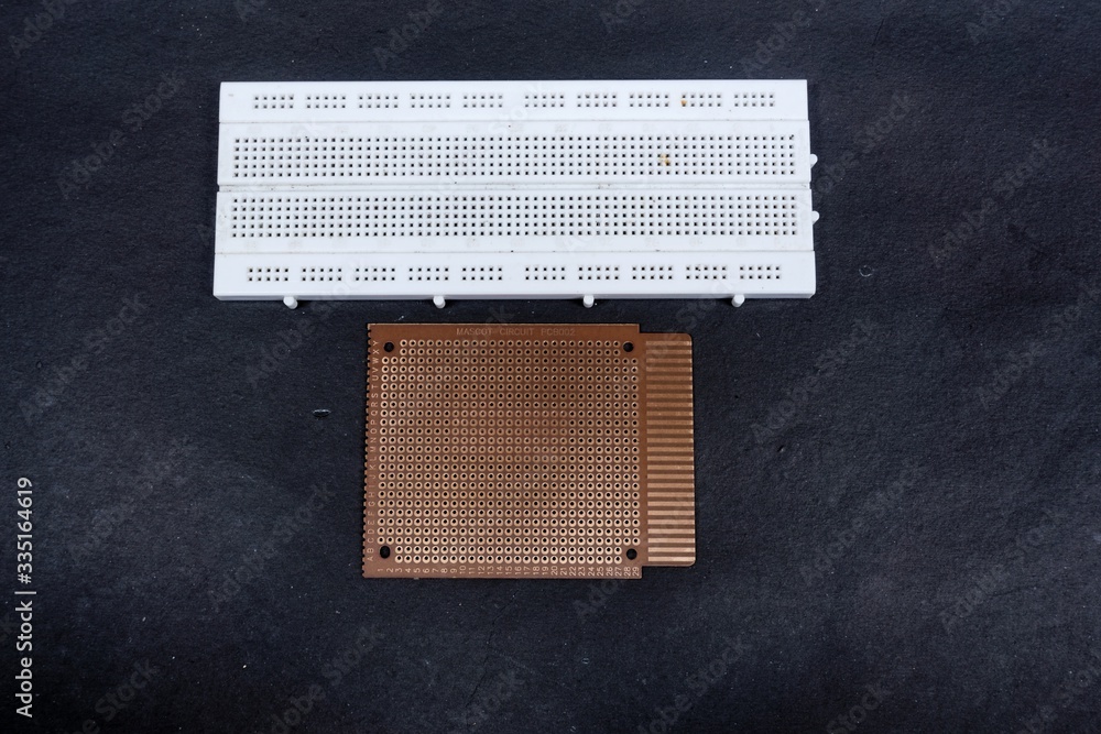 Electronic components called breadboards and perforated PCBs Stock