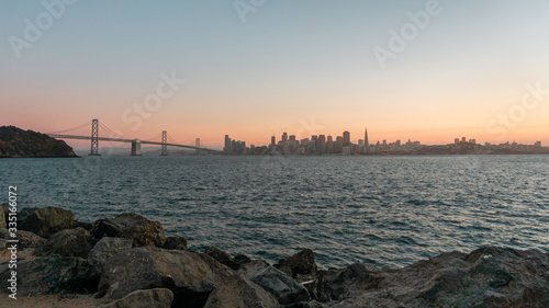San Francisco Bay sunset with city skyline and Bay Bridge view from Treasure Island