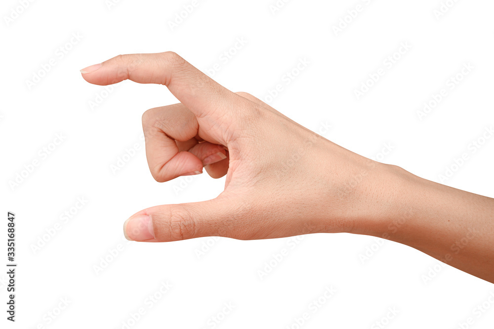 hand holding something like a bottle or can hand holding something like a bottle or can