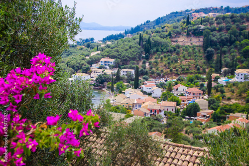 Corfu island historical heritage, architecture, cosy streets, houses, buildings, doors, windows, vegetation, Greece, summer