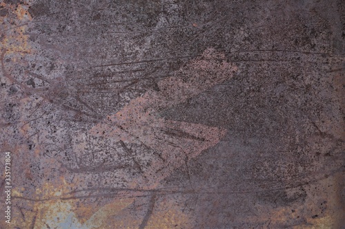 texture of the metal cover of the old electrical panel on the cover there is abundant rust and a lightning bolt