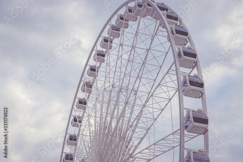 Ferris Wheel with blue sky on sunny day