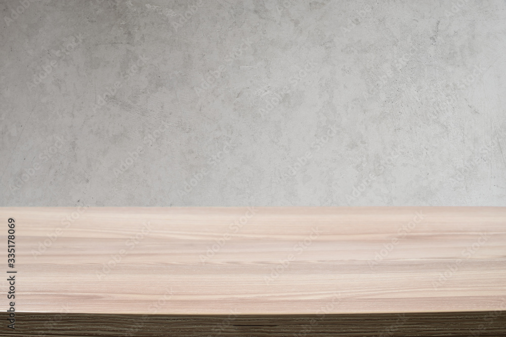 Scandinavian inspired wood table and concrete background Scandinavian inspired wood table and concrete background