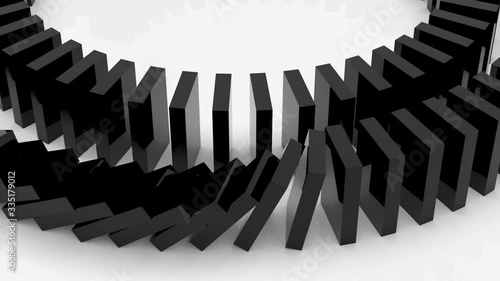 A close-up camera captures part of a large spiral of black dominoes on a white background. Bones fall towards the movement.