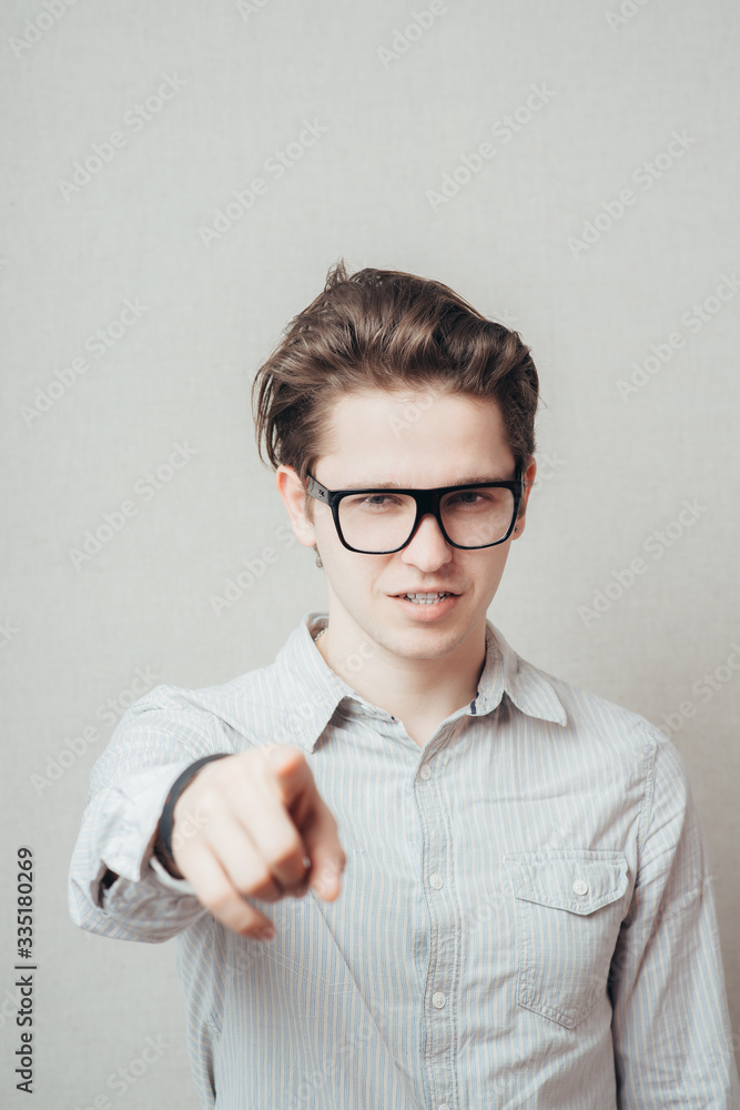 picture of attractive businessman in glasses pointing his finger picture of attractive businessman in glasses pointing his finger