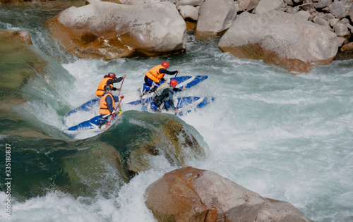 Extreme catamaran rafting on the mountain rivers of the Tien Shan
