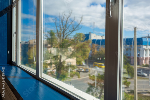 plastic white window installed in an office or apartment building