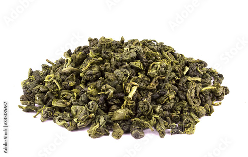 Dry green tea leaves isolated on white background