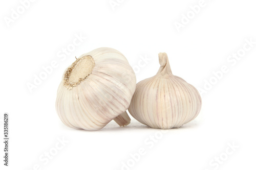 fresh garlic isolated on white background. Concept with vitamin and energy food.