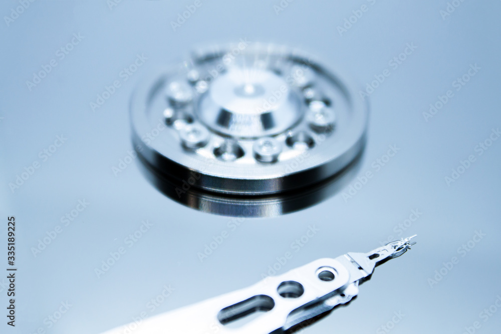 Close up of opened hard disk drive Close up of opened hard disk drive