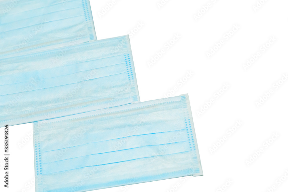 Fototapeta premium Surgical mask with rubber ear straps. antivirus medical mask for protection covid-19. Protection corona virus concept.