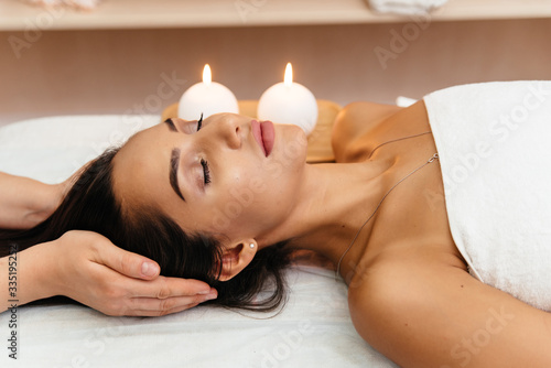 Asian young woman enjoying scalp massage