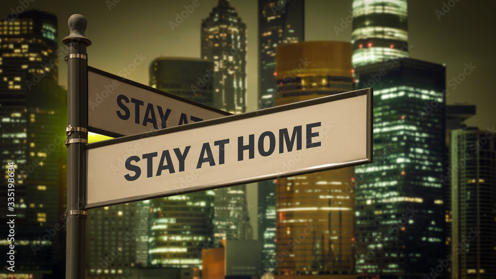 Obraz premium Street Sign STAY AT HOME