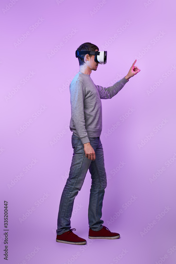 Man is using virtual reality headset. Man is using virtual reality headset.