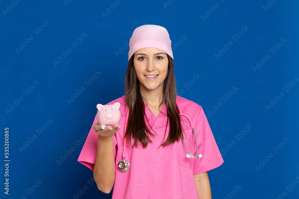 Young doctor with a pink uniform Young doctor with a pink uniform