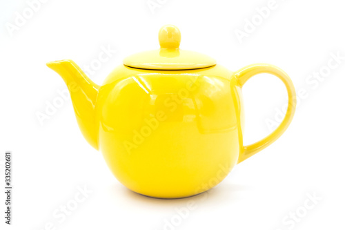 cup with tea and teapot on white  background, over light