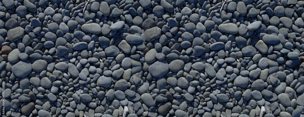 Black pebbles background. Banner texture - obrazy, fototapety, plakaty 