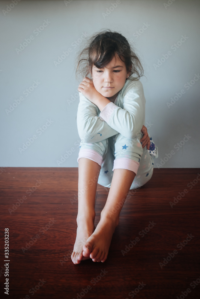 young caucasian gril bored at home in self isolation during corona virus lockdown young caucasian gril bored at home in self isolation during corona virus lockdown