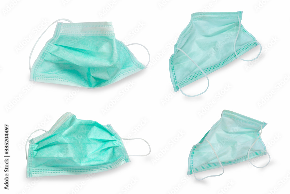 Medical masks on a white background,with clipping path,Caution - you should always remember that. Just wear a mask No antivirus is 100% Do not touch the mask itself during the day.
