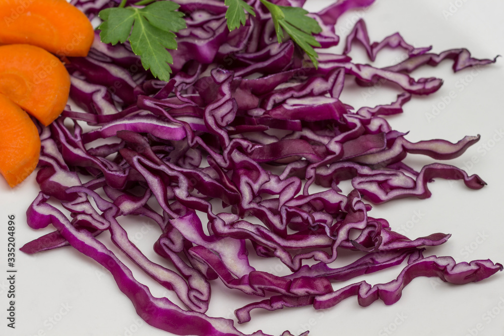 Sliced red cabbage on white background. Sliced red cabbage on white background.