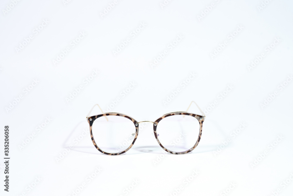 Stylish classic glasses on a white background. Isolate Stylish classic glasses on a white background. Isolate