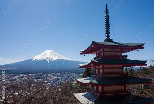 Chureito Pagoda temple and the highest mountain of Japan, Mt Fuji, in the distance