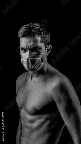a man in a mask during an coronavirus epidemic (covid-19) (ID: 335210079)