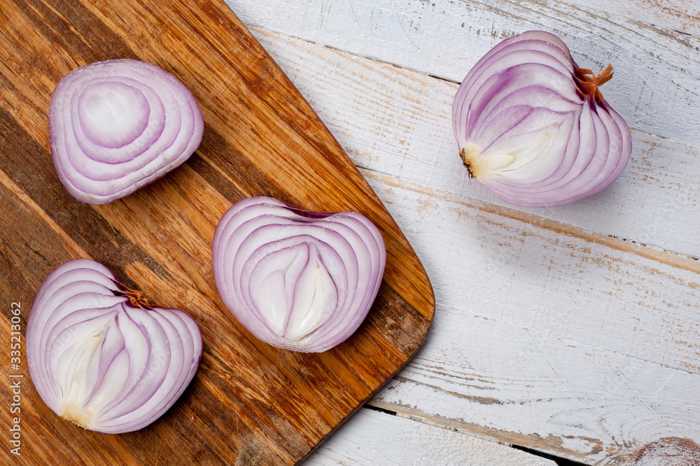 Red onion, lettuce. Health benefits, very rich in vitamins. Background for vegetables and garden plants and cooking. Red onion, lettuce. Health benefits, very rich in vitamins. Background for vegetables and garden plants and cooking.