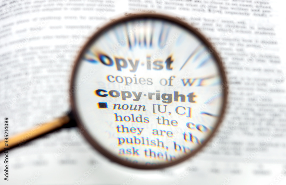 magnifying glass on the word copyright magnifying glass on the word copyright