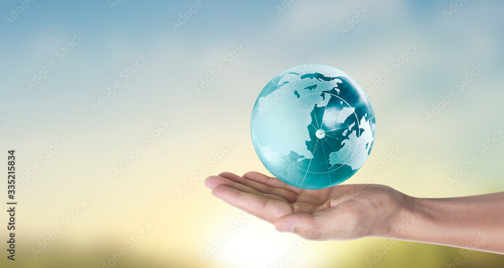 Globe , earth in human hand, holding our planet glowing. image provided by Nasa Globe , earth in human hand, holding our planet glowing. image provided by Nasa