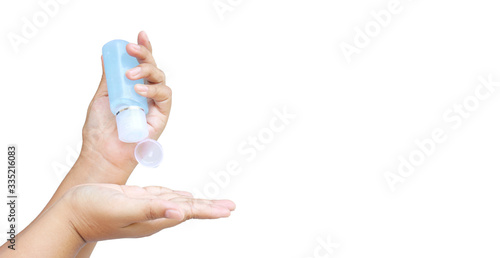 Female hand pressing bottle and pouring alcohol-based sanitize on hands. Liquid soap with pumping from bottle. Applying a moisturizing sanitize. stop coronavirus covid-19