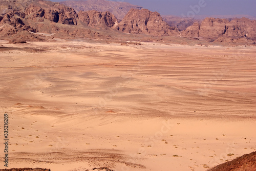 Beautiful panorama of the Sinai Desert. Mountains and sands of different shades. Clear blue sky