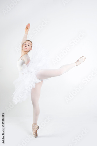 Young ballerina practising ballet moves