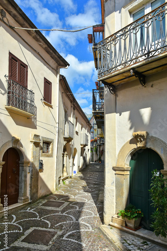 Pizzone, Italy, 07/12/2018. A narrow street between the houses of a village in the Molise region photo