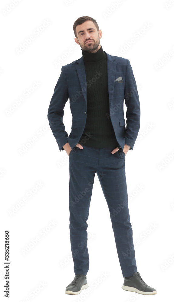 in full growth. confident modern man in business clothes in full growth. confident modern man in business clothes