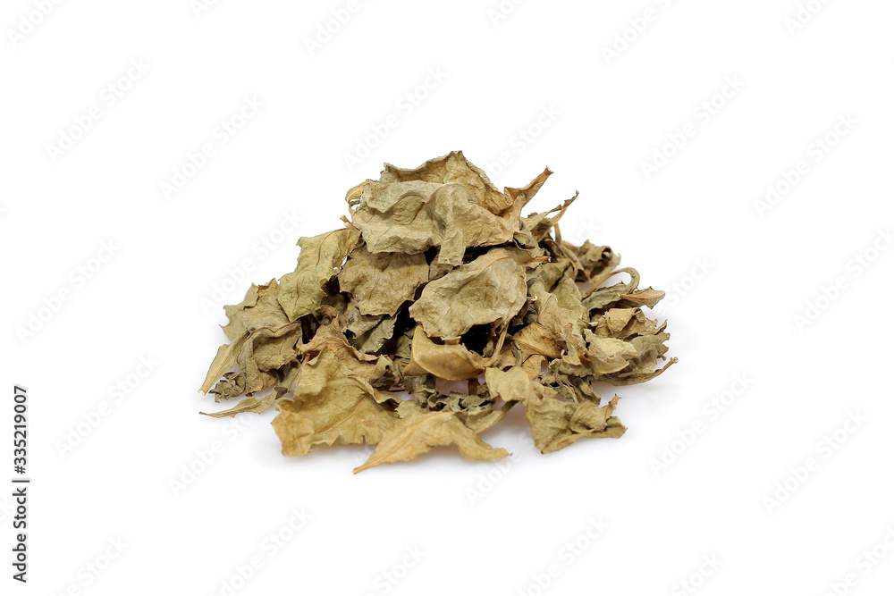 close up Dry tea leaves isolated on white background.
close up Dry tea leaves isolated on white background.