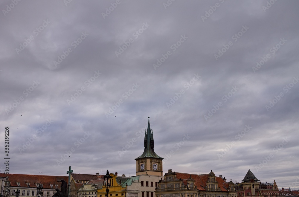 Roofs and spires in a cloudy day (Prague, Czech Republic, Europe)