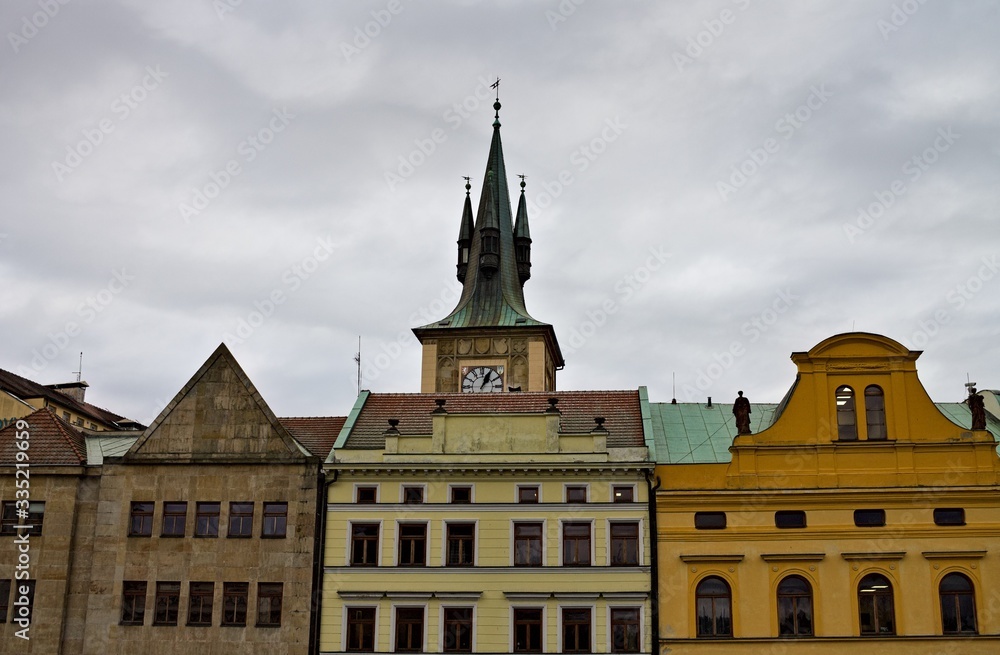 Old bohemian buildings with decorated roofs and spires (Prague, Czech Republic, Europe)