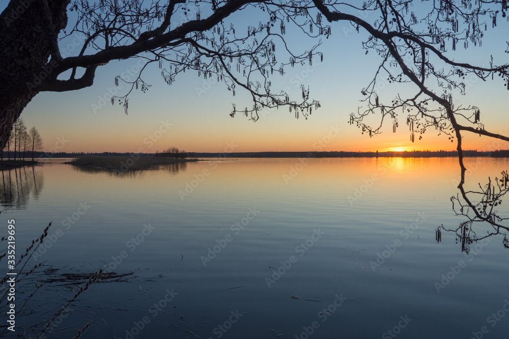 Calm lake in a spring evening on the shores of Lake Tuusula
Calm lake in a spring evening on the shores of Lake Tuusula