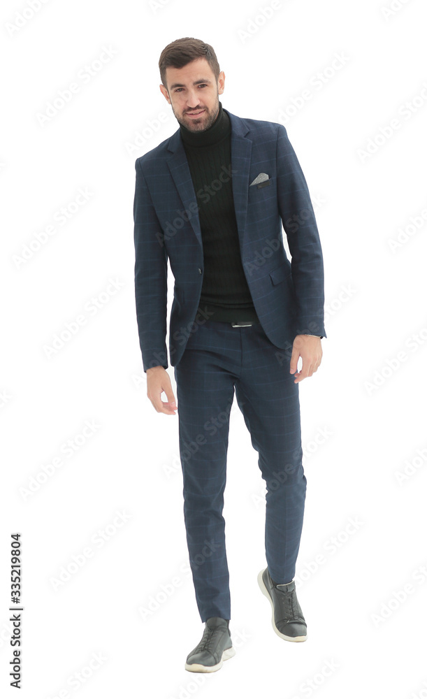 in full growth. confident business man . isolated on white in full growth. confident business man . isolated on white