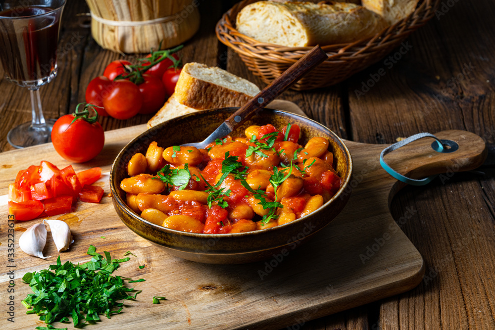 Rustic giant beans with fresh tomato sauce Stock Photo | Adobe Stock