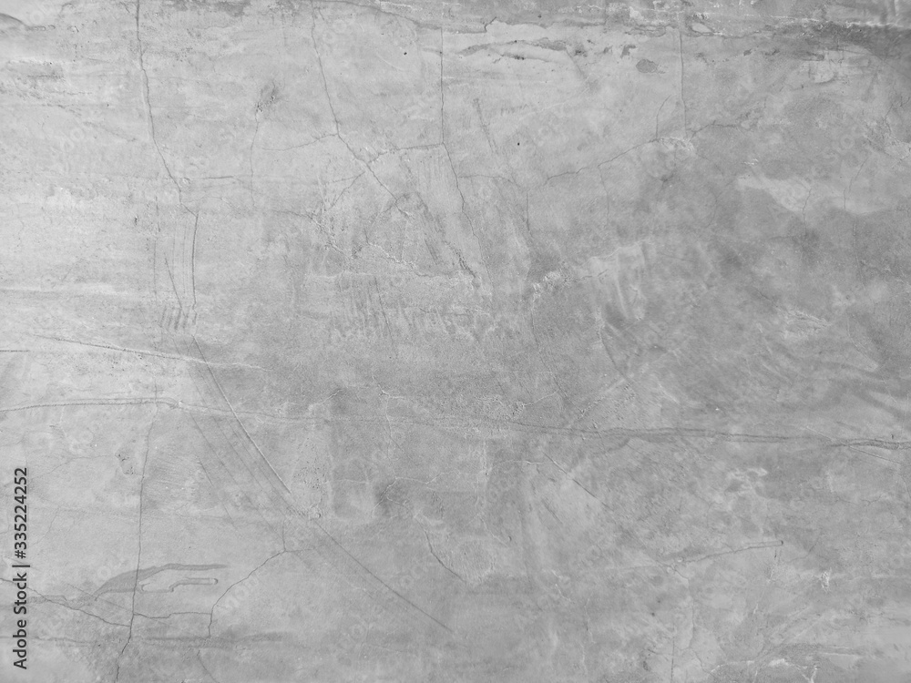 Naklejka premium Cracks on the Cement wall has gray color and smooth abstract surface texture concrete material background