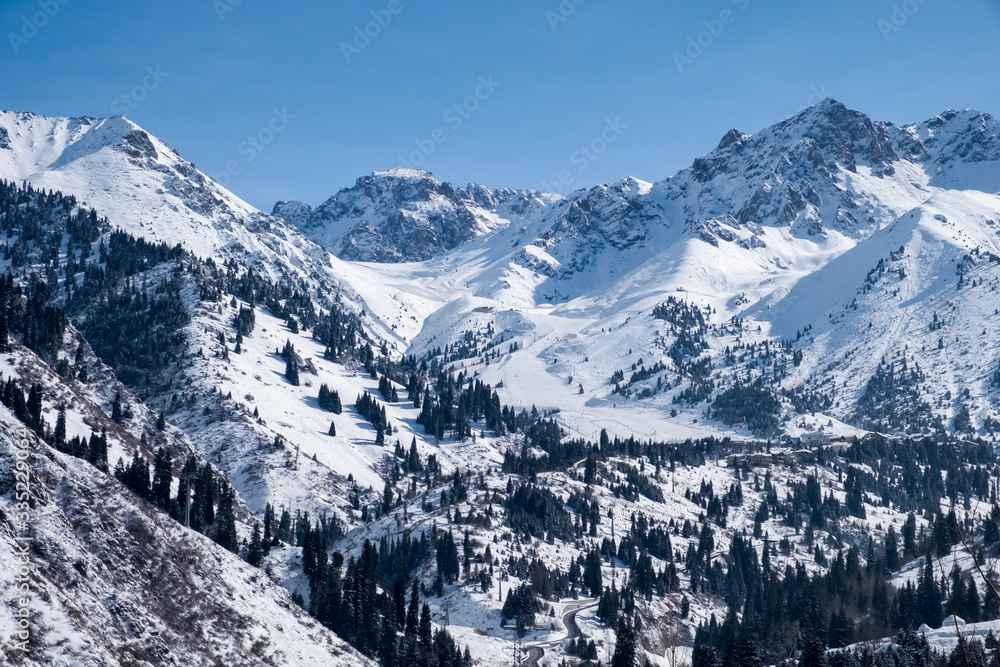 Winter mountains covered with snow landscape. Tien shan mountains in winter.