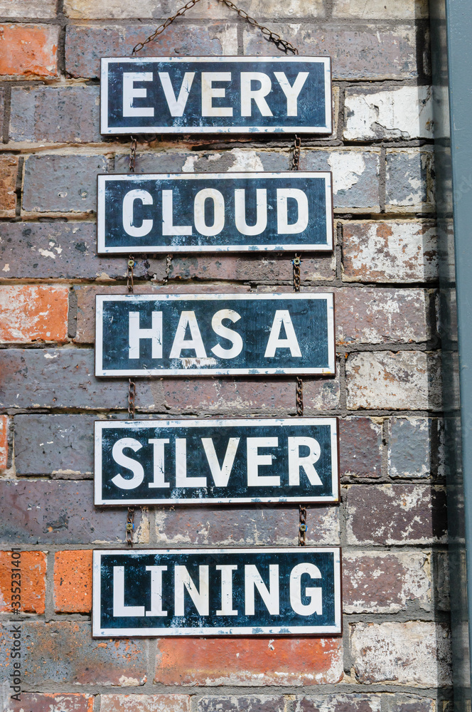 Signs on a brick wall saying Signs on a brick wall saying