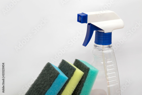 Washcloths and disinfectants. Antibacterial cleaning agent. House cleaning. Alcohol solution. Colorful washcloth.
