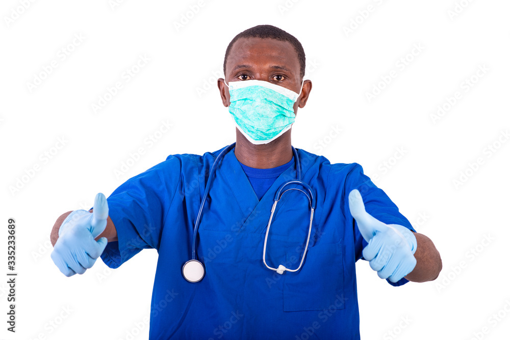 young male doctor showing his thumb. young male doctor showing his thumb.